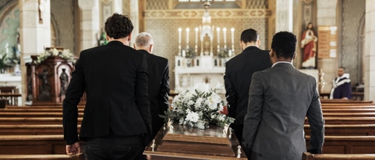 Men carrying a casket