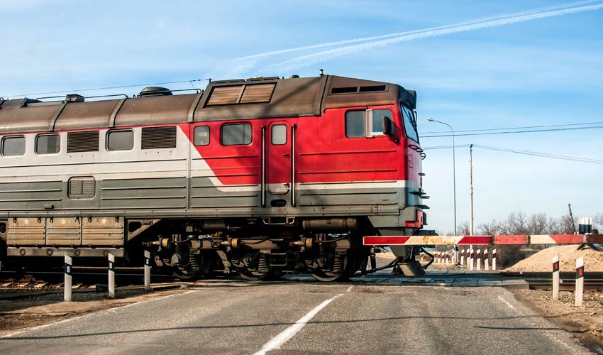 train going through the intersection